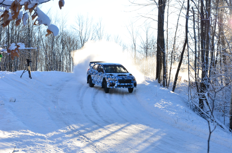 Illustration for article titled Watch The 2015 Subaru WRX STI Rally Car Catch Air Sideways